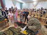 FOUR-year-olds are shown how to use AK-47s and grenade launchers at Russian kindergarten