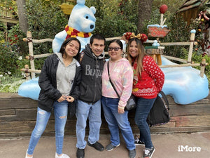 Add some Disney magic to your family holiday photos at Disneyland!
